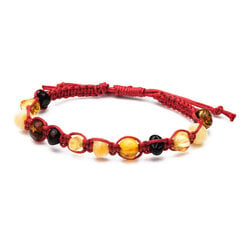 Плетеный красный браслет с кусочками янтаря цена и информация | Браслеты | 220.lv