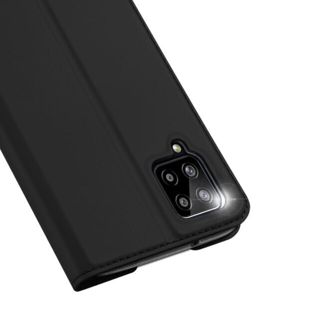 Dux Ducis Premium sērijas Skin Pro Magnētiskās fiksācijas sāniski atverams maks priekš Samsung Galaxy A12 (A125F), melns cena un informācija | Telefonu vāciņi, maciņi | 220.lv