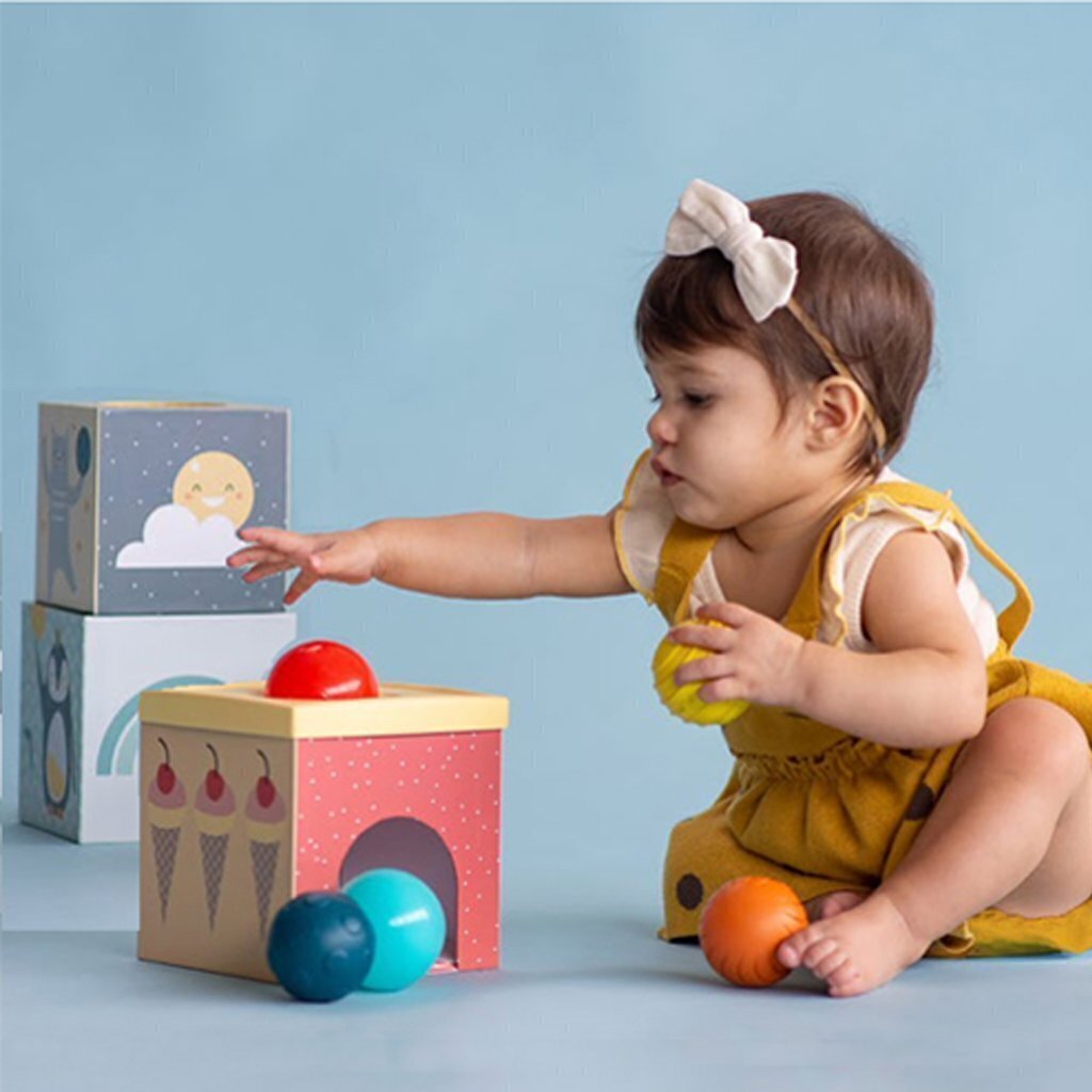 Izglītojoša rotaļlieta Bumbu kaste Taf Toys cena un informācija | Rotaļlietas zīdaiņiem | 220.lv