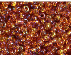 Čehu pērlītes Transparent-Rainbow, medus krāsa (11090) 10/0, 50 g cena un informācija | Rotu veidošana, pērļošana | 220.lv