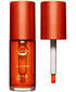 Lūpu spīdums Clarins Water Lip Stain 02 Orange Water, 7 ml cena un informācija | Lūpu krāsas, balzāmi, spīdumi, vazelīns | 220.lv