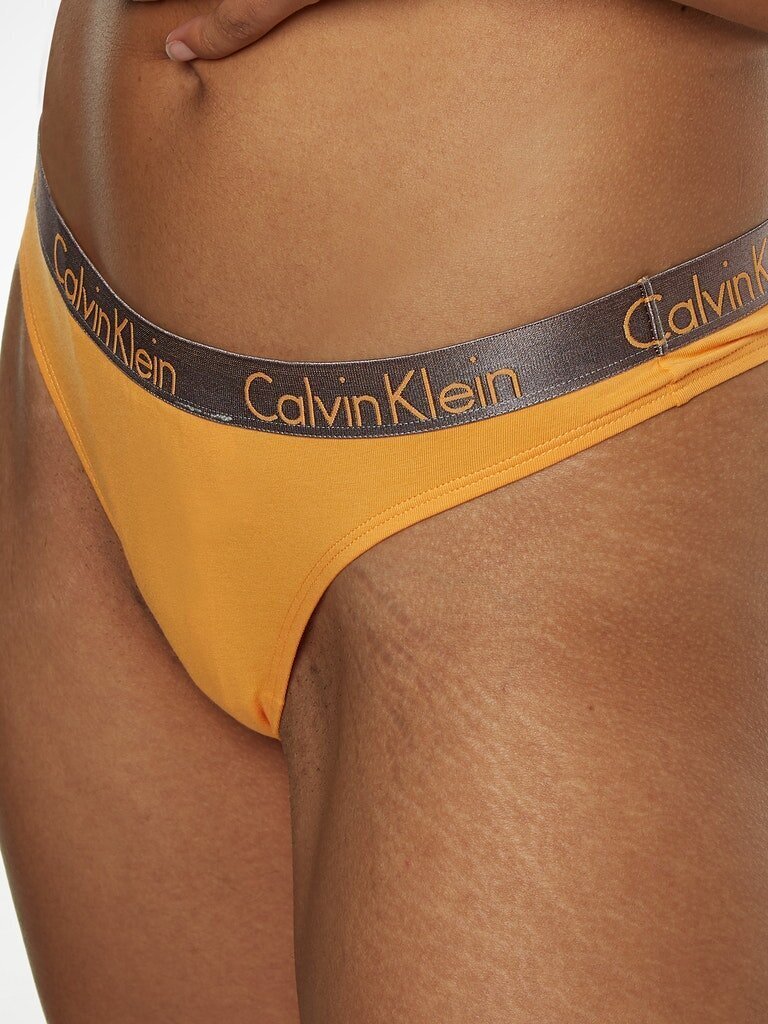 Sieviešu stringbiksītes Calvin Klein THONG, oranžas 000QD3539E SF6 45142 cena un informācija | Sieviešu biksītes | 220.lv