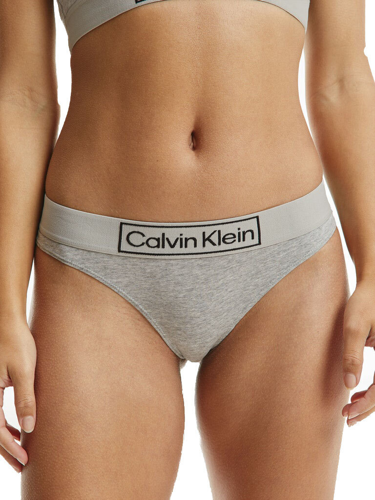 Sieviešu stringbiksītes Calvin Klein THONG, pelēkas 000QF6774E P7A 45166 cena un informācija | Sieviešu biksītes | 220.lv