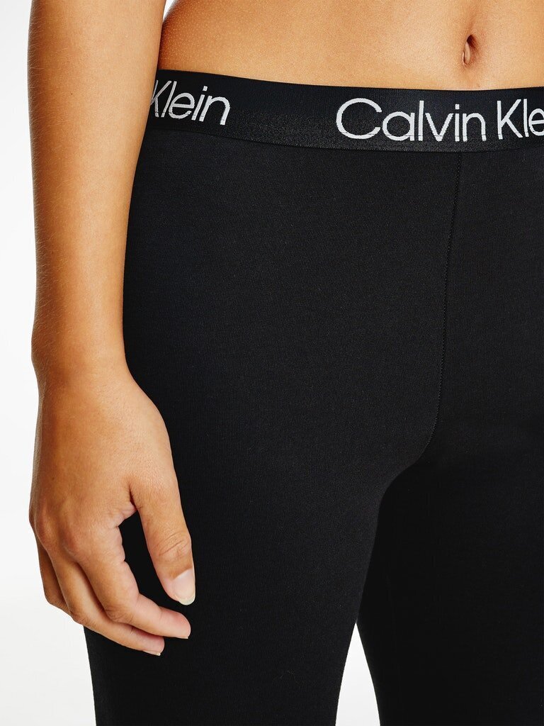 Sieviešu legingi Calvin Klein, melni 000QS6758E UB1 42744 цена и информация | Sporta apģērbs sievietēm | 220.lv