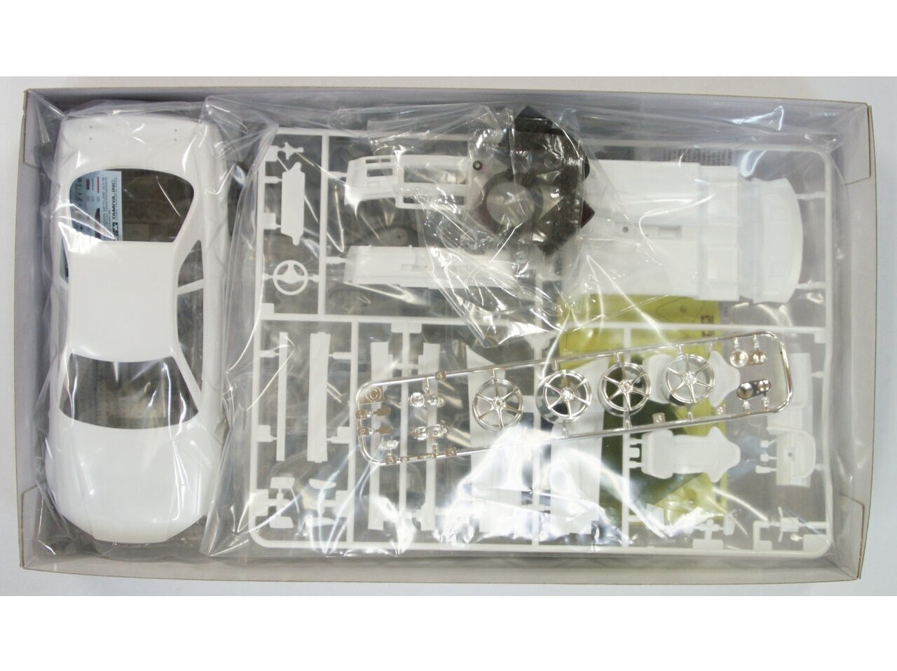 Tamiya - Nissan Skyline GT-R V Spec (R34), 1/24, 24210 cena un informācija | Konstruktori | 220.lv