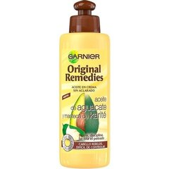 Масло ши для волос Garnier Fructis Original Remedies, 200 мл цена и информация | Распылите крем-спрей на волосы на расстоянии 20-25 см, расчешите их расческой. | 220.lv