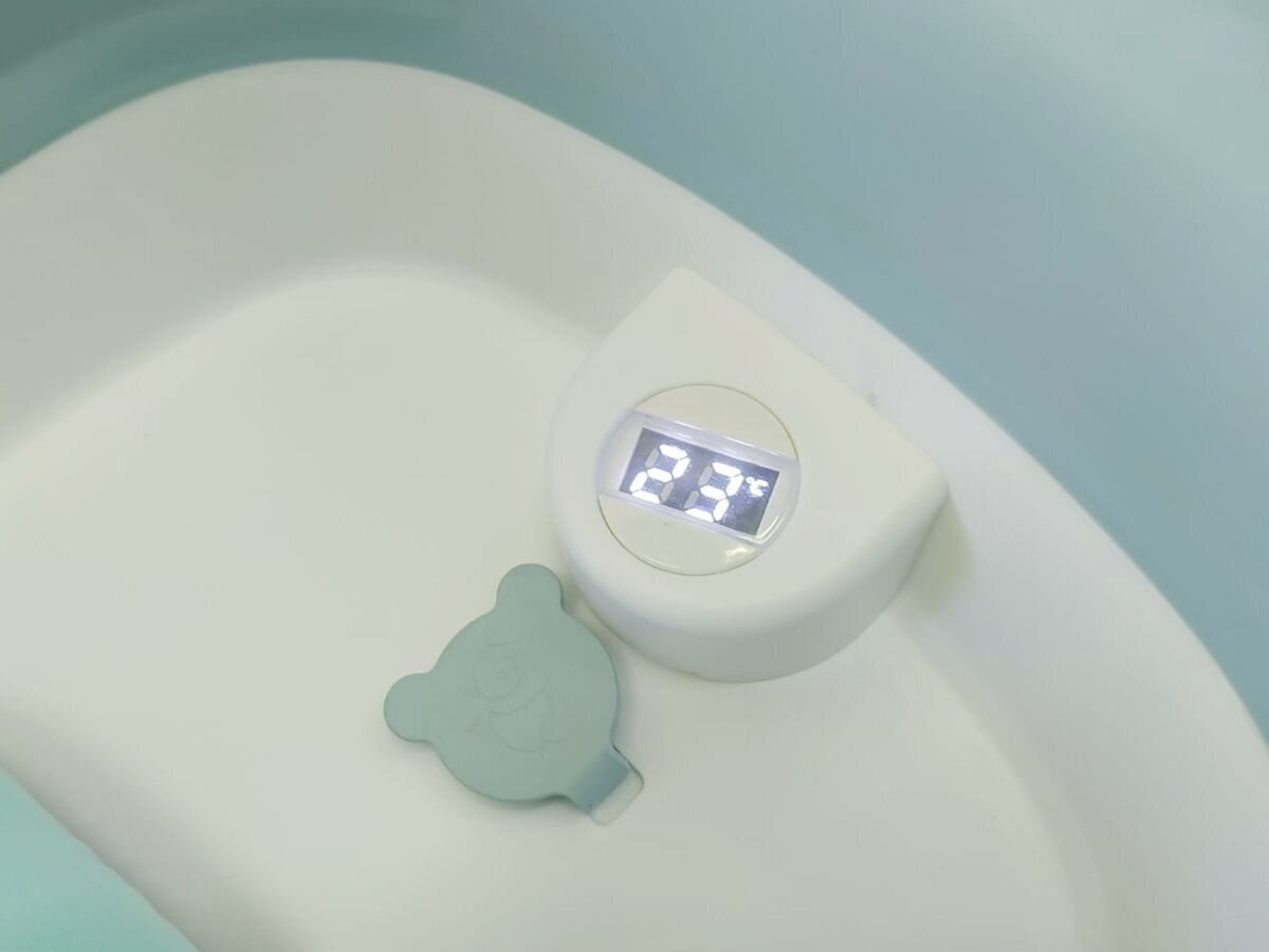 Salokāma vanna ar termometru un zilu spilventiņu cena un informācija | Mazuļa mazgāšana | 220.lv