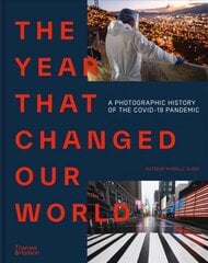 Year That Changed Our World: A Photographic History of the Covid-19 Pandemic цена и информация | Книги по фотографии | 220.lv