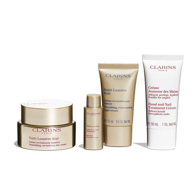 Sejas ādas kopšanas komplekts Clarins Nutri-Lumière: dienas krēms, 50 ml + nakts krēms, 15 ml + sejas emulsija, 10 ml + roku un nagu kopšanas krēms, 30 ml + kosmētikas somiņa cena un informācija | Sejas krēmi | 220.lv