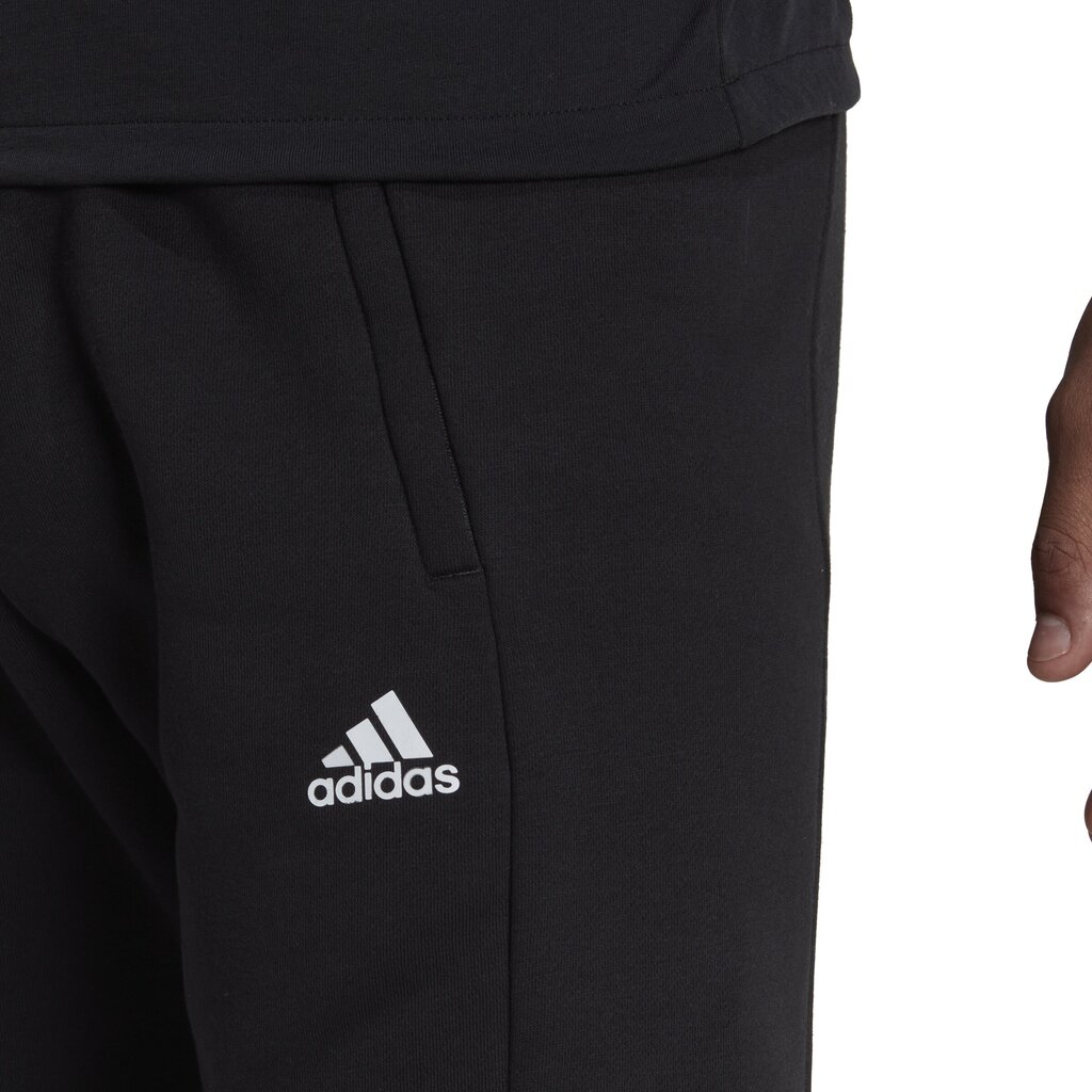 Adidas Bikses M Fl Gfx Pant Black HN9063 HN9063/L цена и информация | Sporta apģērbs vīriešiem | 220.lv