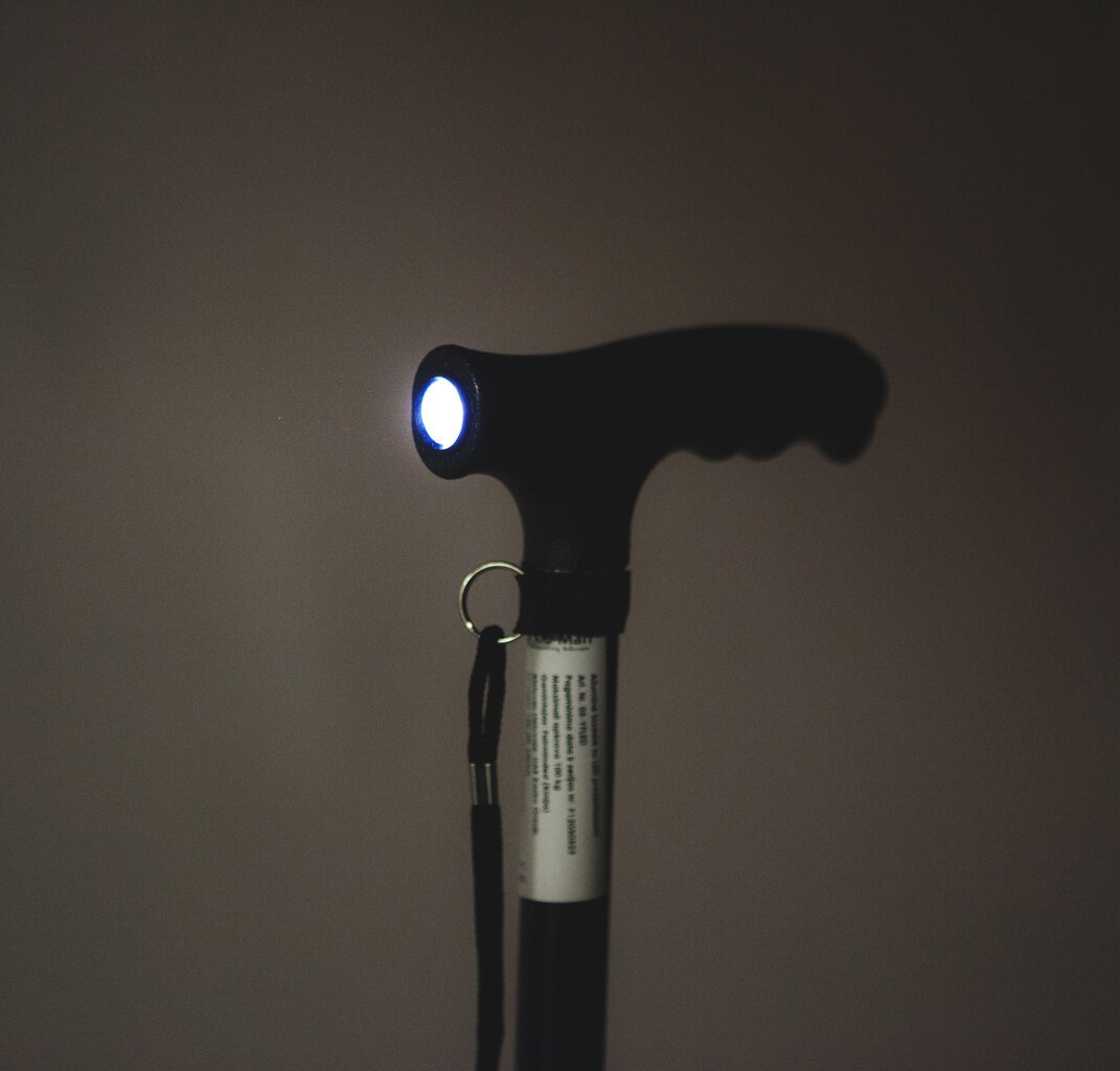 Spieķis ar LED prožektoru Kid-Man, melns цена и информация | Nūjošanas nūjas | 220.lv