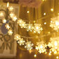 Sniegpārsliņu Ziemassvētku lampiņu virtene, 10m, 100 LED, LIVMAN TY-101 цена и информация | Ziemassvētku lampiņas, LED virtenes | 220.lv