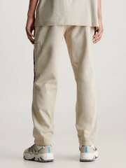Bikses vīriešiem Calvin Klein Jeans Relaxed Logo Tape Plaza Taupe 560076966, bēšas cena un informācija | Vīriešu bikses | 220.lv