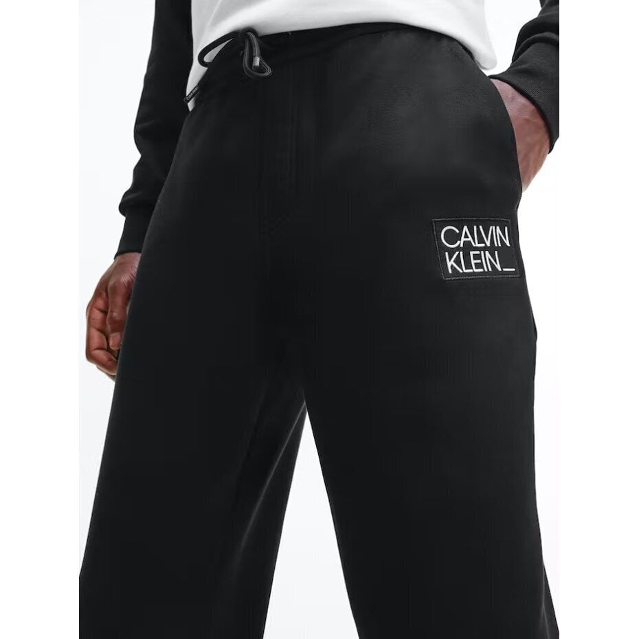Calvin Klein ikdienas bikses vīriešiem 8719854488439, melnas cena un informācija | Vīriešu bikses | 220.lv