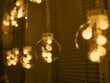 Aizkaru spuldzītes bumbiņas, silti baltas, 3 m cena un informācija | Ziemassvētku lampiņas, LED virtenes | 220.lv
