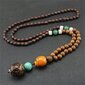 NEPĀLIJAS BUDDHA MALA Tibetas koka kaklarota Rokām darināts amulets EL79 цена и информация | Kaklarotas | 220.lv
