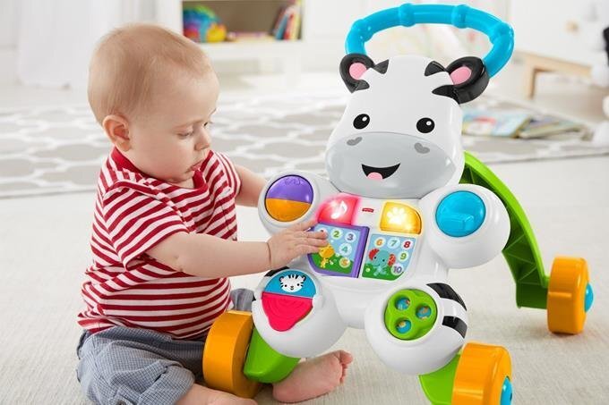 Muzikālais staigulis Fisher Price, DPL53 (Poļu valodā) cena un informācija | Rotaļlietas zīdaiņiem | 220.lv