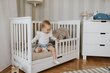 Bērnu gulta Klupś Iwo 120x60, balta cena un informācija | Zīdaiņu gultas | 220.lv