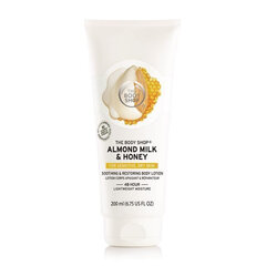 Nomierinošs un reģenerējošs ķermeņa losjons The Body Shop Almond Milk & Honey 200 ml цена и информация | Кремы, лосьоны для тела | 220.lv