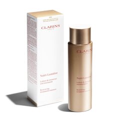 Восстанавливающий лосьон для лица Clarins Nutri-Lumiere 200 мл цена и информация | Сыворотки для лица, масла | 220.lv