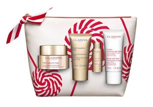 Набор Clarins Nutri Lumiere: дневной крем для лица 50 мл + ночной крем для лица 15 мл + лосьон для лица 10 мл + крем для рук 30 мл + косметичка цена и информация | Кремы для лица | 220.lv